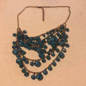 Lovely stranded aqua and gold statement necklace